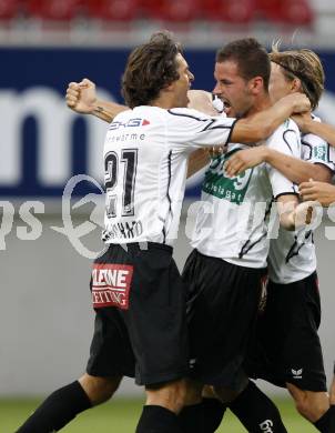 Fussball. Tipp3-Bundesliga. SK Austria Kelag Kaernten  gegen SK Sturm Graz. Torjubel Oliver Pusztai, Jocelyn Blanchard (Austria Kaernten). Klagenfurt, 9.8.2009 
Foto: Kuess

---
pressefotos, pressefotografie, kuess, qs, qspictures, sport, bild, bilder, bilddatenbank