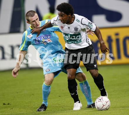 Fussball. Tipp3-Bundesliga. SK Austria Kelag Kaernten  gegen SK Sturm Graz. Sandro, (Austria Kaernten), Ilia Kandelaki (Graz). Klagenfurt, 9.8.2009 
Foto: Kuess

---
pressefotos, pressefotografie, kuess, qs, qspictures, sport, bild, bilder, bilddatenbank