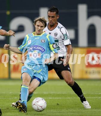 Fussball. Tipp3-Bundesliga. SK Austria Kelag Kaernten  gegen SK Sturm Graz. Martin Zivny, (Austria Kaernten), Andreas Hoelzl (Graz). Klagenfurt, 9.8.2009 
Foto: Kuess

---
pressefotos, pressefotografie, kuess, qs, qspictures, sport, bild, bilder, bilddatenbank