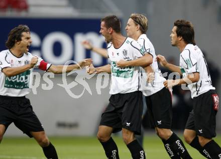 Fussball. Tipp3-Bundesliga. SK Austria Kelag Kaernten  gegen SK Sturm Graz. Torjubel Oliver Pusztai, Jocelyn Blanchard, Thomas Hinum, Fernando Troyansky(Austria Kaernten). Klagenfurt, 9.8.2009 
Foto: Kuess

---
pressefotos, pressefotografie, kuess, qs, qspictures, sport, bild, bilder, bilddatenbank