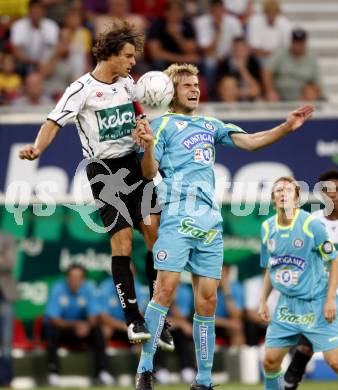 Fussball. Tipp3-Bundesliga. SK Austria Kelag Kaernten  gegen SK Sturm Graz. Jocelyn Blanchard, (Austria Kaernten), Manuel Weber (Graz). Klagenfurt, 9.8.2009 
Foto: Kuess

---
pressefotos, pressefotografie, kuess, qs, qspictures, sport, bild, bilder, bilddatenbank