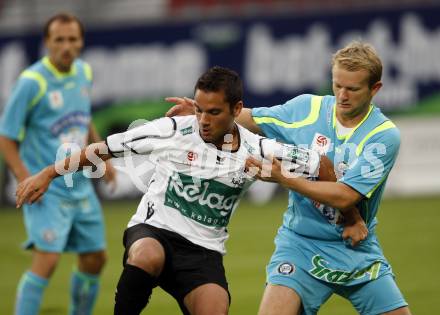 Fussball. Tipp3-Bundesliga. SK Austria Kelag Kaernten  gegen SK Sturm Graz. Andre Schembri, (Austria Kaernten), Mario Sonnleitner (Graz). Klagenfurt, 9.8.2009 
Foto: Kuess

---
pressefotos, pressefotografie, kuess, qs, qspictures, sport, bild, bilder, bilddatenbank