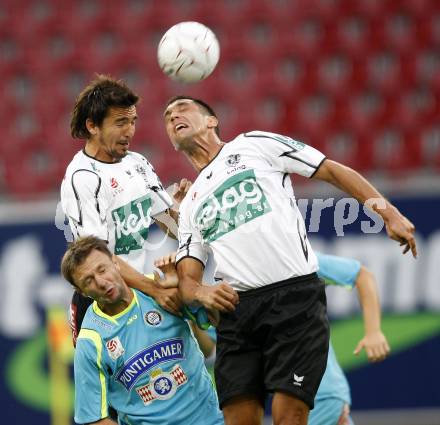 Fussball. Tipp3-Bundesliga. SK Austria Kelag Kaernten  gegen SK Sturm Graz. Fernando Troyansky, Martin Zivny, (Austria Kaernten), Samir Muratovic (Graz). Klagenfurt, 9.8.2009 
Foto: Kuess

---
pressefotos, pressefotografie, kuess, qs, qspictures, sport, bild, bilder, bilddatenbank