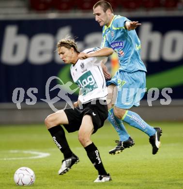 Fussball. Tipp3-Bundesliga. SK Austria Kelag Kaernten  gegen SK Sturm Graz. Stefan Hierlaender, (Austria Kaernten), Ilia Kandelaki (Graz). Klagenfurt, 9.8.2009 
Foto: Kuess

---
pressefotos, pressefotografie, kuess, qs, qspictures, sport, bild, bilder, bilddatenbank