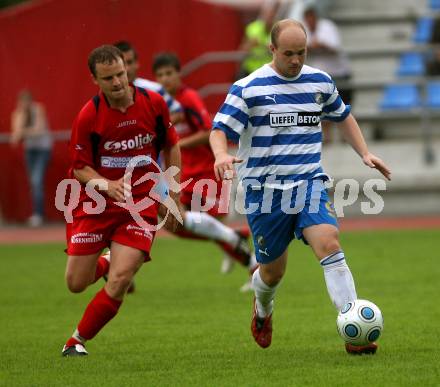 Fussball. Kaerntner Liga. VSV gegen SV Sittersdorf. Barrazutti Daniel (VSV), Bierbaumer Gunther (Sittersdorf). Villach, 9.8.2009 
Foto: Kuess

---
pressefotos, pressefotografie, kuess, qs, qspictures, sport, bild, bilder, bilddatenbank