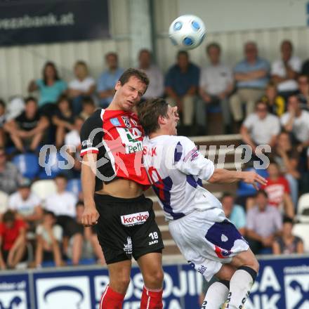 Fussball OEFB Cup. SAK gegen WAC/St. Andrae.  Grega Triplat (SAK), Thomas Pirker (WAC/St. Andrae).Klagenfurt, am 14.8.2009.
Foto: Kuess
---
pressefotos, pressefotografie, kuess, qs, qspictures, sport, bild, bilder, bilddatenbank