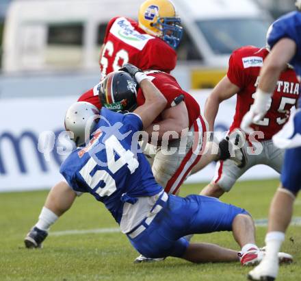 American Football European Championsship 2009. Oesterreich gegen Italien. Bernd Leitsoni (AUT), Andrea Benoni (ITA). Wolfsberg, am 18.8.2009.
Foto: Kuess
---
pressefotos, pressefotografie, kuess, qs, qspictures, sport, bild, bilder, bilddatenbank