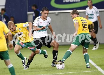 Fussball Austria Kaernten gegen SV Josko Ried. Markus Pink (Kaernten), Peter Hackmair, Herwig Drechsel (Ried). Klagenfurt, am 21.8.2009.
Foto: Kuess
---
pressefotos, pressefotografie, kuess, qs, qspictures, sport, bild, bilder, bilddatenbank