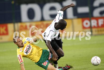 Fussball Austria Kaernten gegen SV Josko Ried. Modou Jagne (Kaernten), Martin Schrammel (Ried). Klagenfurt, am 21.8.2009.
Foto: Kuess
---
pressefotos, pressefotografie, kuess, qs, qspictures, sport, bild, bilder, bilddatenbank