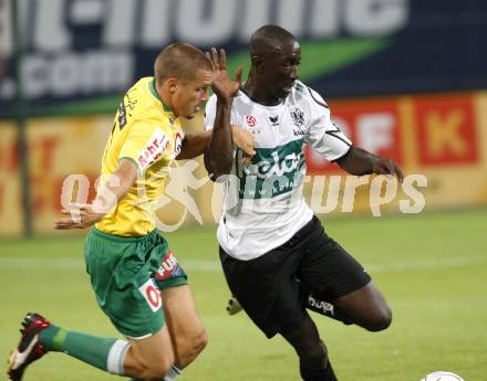 Fussball Austria Kaernten gegen SV Josko Ried. Modou Jagne (Kaernten), Martin Schrammel (Ried). Klagenfurt, am 21.8.2009.
Foto: Kuess
---
pressefotos, pressefotografie, kuess, qs, qspictures, sport, bild, bilder, bilddatenbank