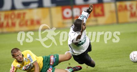 Fussball Austria Kaernten gegen SV Josko Ried. Modou Jagne (Kaernten), Martin Schrammel (Ried). Klagenfurt, am 21.8.2009.
Foto: Kuess
---
pressefotos, pressefotografie, kuess, qs, qspictures, sport, bild, bilder, bilddatenbank