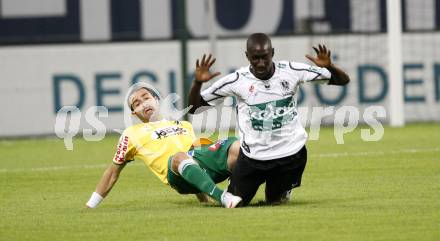 Fussball Austria Kaernten gegen SV Josko Ried. Modou Jagne (Kaernten), Ignacio Rodriguez Ortiz (Ried). Klagenfurt, am 21.8.2009.
Foto: Kuess
---
pressefotos, pressefotografie, kuess, qs, qspictures, sport, bild, bilder, bilddatenbank