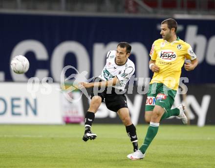 Fussball Austria Kaernten gegen SV Josko Ried. Leonhard Kaufmann (Kaernten), Ignacio Rodriguez Ortiz (Ried). Klagenfurt, am 21.8.2009.
Foto: Kuess
---
pressefotos, pressefotografie, kuess, qs, qspictures, sport, bild, bilder, bilddatenbank