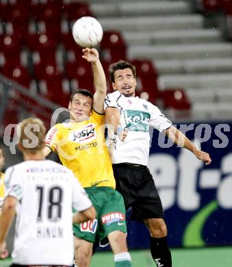 Fussball. Tipp3-Bundesliga. SK Austria Kelag Kaernten  gegen SV Josko Ried. Troyansky Fernando (Austria Kaernten), Salihi Hamdi (Ried). Klagenfurt, 21.8.2009. 
Foto: Kuess

---
pressefotos, pressefotografie, kuess, qs, qspictures, sport, bild, bilder, bilddatenbank