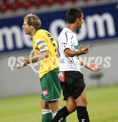 Fussball Austria Kaernten gegen SV Josko Ried. Andre Schembri (Kaernten), Herwig Drechsel (Ried). Klagenfurt, am 21.8.2009.
Foto: Kuess
---
pressefotos, pressefotografie, kuess, qs, qspictures, sport, bild, bilder, bilddatenbank