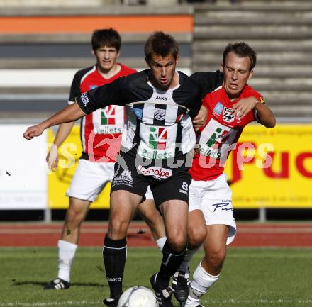 Fussball. Regionalliga.  WAC/St. Andrae gegen FC St. Veit.  Messner Gernot (WAC), Graefischer David (St. Veit). Wolfsberg, 6.9.2009.
Foto: Kuess

---
pressefotos, pressefotografie, kuess, qs, qspictures, sport, bild, bilder, bilddatenbank