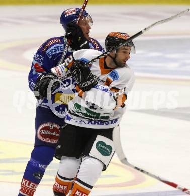 EBEL. Eishockey Bundesliga. EC Pasut VSV gegen Eishockeyclub Graz 99ers. Mickey Elick (VSV), JARRETT Rodney (Graz). Villach, am 13.9.2009.
Foto: Kuess 


---
pressefotos, pressefotografie, kuess, qs, qspictures, sport, bild, bilder, bilddatenbank