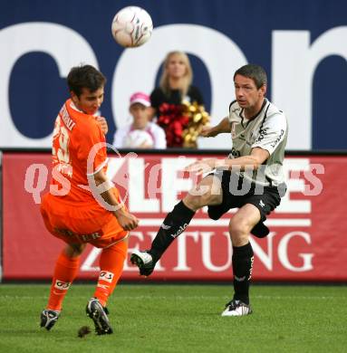 Fussball. Tipp3-Bundesliga. SK Austria Kelag Kaernten  gegen FK Austria Wien. Martin Hiden (Austria Kaernten), Markus Suttner (Wien). Klagenfurt, 12.9.2009. 
Foto: Kuess

---
pressefotos, pressefotografie, kuess, qs, qspictures, sport, bild, bilder, bilddatenbank