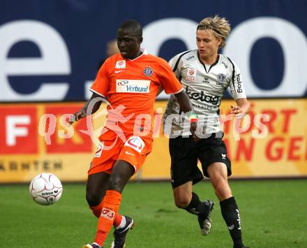 Fussball. Tipp3-Bundesliga. SK Austria Kelag Kaernten  gegen FK Austria Wien.  Stefan Hierlaender (Austria Kaernten), Mamadou Jagne (Wien). Klagenfurt, 28.11.2008. 
Foto: Kuess

---
pressefotos, pressefotografie, kuess, qs, qspictures, sport, bild, bilder, bilddatenbank