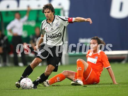 Fussball. Tipp3-Bundesliga. SK Austria Kelag Kaernten  gegen FK Austria Wien. Jocelyn Blanchard (Austria Kaernten), Julian Baumgartlinger (Austria Wien). Klagenfurt, 12.9.2009. 
Foto: Kuess

---
pressefotos, pressefotografie, kuess, qs, qspictures, sport, bild, bilder, bilddatenbank