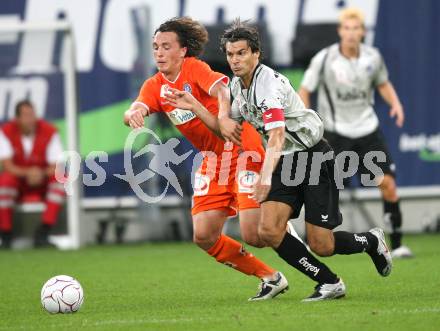 Fussball. Tipp3-Bundesliga. SK Austria Kelag Kaernten  gegen FK Austria Wien. Jocelyn Blanchard (Austria Kaernten), Julian Baumgartlinger (Austria Wien). Klagenfurt, 12.9.2009. 
Foto: Kuess

---
pressefotos, pressefotografie, kuess, qs, qspictures, sport, bild, bilder, bilddatenbank