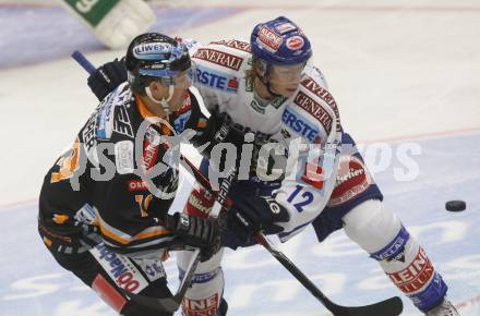 EBEL. Eishockey Bundesliga. VSV gegen EHC Liwest Linz. Michael Raffl (VSV), Robert Shearer (Linz). Villach, am 22.9.2009.
Foto: Kuess
---
pressefotos, pressefotografie, kuess, qs, qspictures, sport, bild, bilder, bilddatenbank