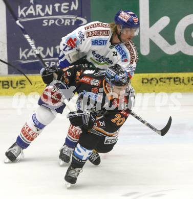 EBEL. Eishockey Bundesliga. VSV gegen EHC Liwest Linz. Thomas Pfeffer (VSV), Brad Purdie (Linz). Villach, am 22.9.2009.
Foto: Kuess
---
pressefotos, pressefotografie, kuess, qs, qspictures, sport, bild, bilder, bilddatenbank