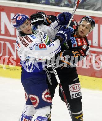 EBEL. Eishockey Bundesliga. VSV gegen EHC Liwest Linz. Andreas Kristler (VSV), LUKAS Robert (Linz). Villach, am 22.9.2009.
Foto: Kuess 


---
pressefotos, pressefotografie, kuess, qs, qspictures, sport, bild, bilder, bilddatenbank