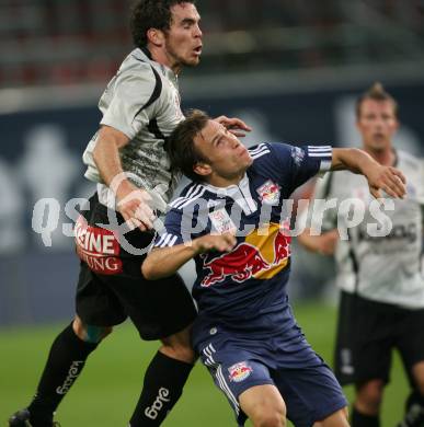 Fussball. Tipp3-Bundesliga. SK Austria Kelag Kaernten  gegen Red Bull Salzburg. Wolfgang Mair (Austria Kaernten), Andreas Ulmer (Red Bull Salzburg). Klagenfurt, 26.9.2009. 
Foto: Kuess 
---
pressefotos, pressefotografie, kuess, qs, qspictures, sport, bild, bilder, bilddatenbank