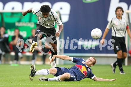 Fussball. Tipp3-Bundesliga. SK Austria Kelag Kaernten  gegen Red Bull Salzburg.  Sandro Ferreira Da Silva (Austria Kaernten), Christian Schwegler (Red Bull Salzburg). Klagenfurt, 26.9.2009. 
Foto: Kuess 
---
pressefotos, pressefotografie, kuess, qs, qspictures, sport, bild, bilder, bilddatenbank