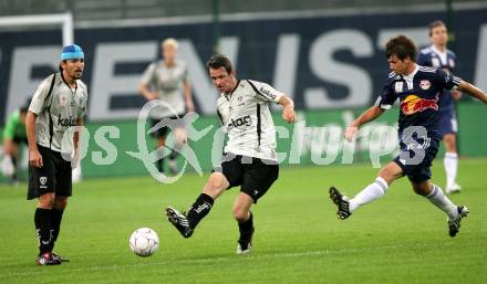 Fussball. Tipp3-Bundesliga. SK Austria Kelag Kaernten  gegen Red Bull Salzburg.  Fernando Troyansky, Martin Hiden,  (Austria Kaernten), Franz Schiemer (Red Bull Salzburg). Klagenfurt, 26.9.2009.
Foto: Kuess  

---
pressefotos, pressefotografie, kuess, qs, qspictures, sport, bild, bilder, bilddatenbank