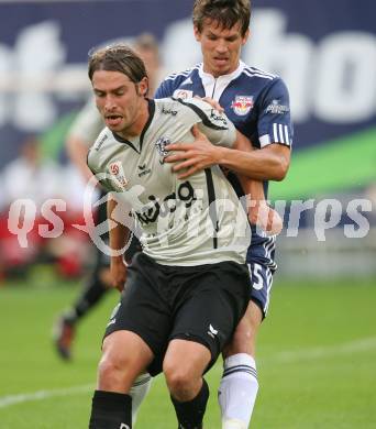 Fussball. Tipp3-Bundesliga. SK Austria Kelag Kaernten  gegen Red Bull Salzburg.  Marc Sand (Austria Kaernten), Franz Schiemer (Red Bull Salzburg). Klagenfurt, 26.9.2009. 
Foto: Kuess 
Foto: Kuess 
---
pressefotos, pressefotografie, kuess, qs, qspictures, sport, bild, bilder, bilddatenbank