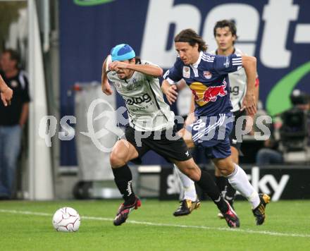 Fussball. Tipp3-Bundesliga. SK Austria Kelag Kaernten  gegen Red Bull Salzburg.  Fernando Troyansky (Austria Kaernten), Rene Aufhauser (Red Bull Salzburg). Klagenfurt, 26.9.2009.
Foto: Kuess  

---
pressefotos, pressefotografie, kuess, qs, qspictures, sport, bild, bilder, bilddatenbank