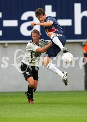 Fussball. Tipp3-Bundesliga. SK Austria Kelag Kaernten  gegen Red Bull Salzburg.  Thomas Riedl (Austria Kaernten), Franz Schiemer (Red Bull Salzburg). Klagenfurt, 26.9.2009. 
Foto: Kuess 
---
pressefotos, pressefotografie, kuess, qs, qspictures, sport, bild, bilder, bilddatenbank