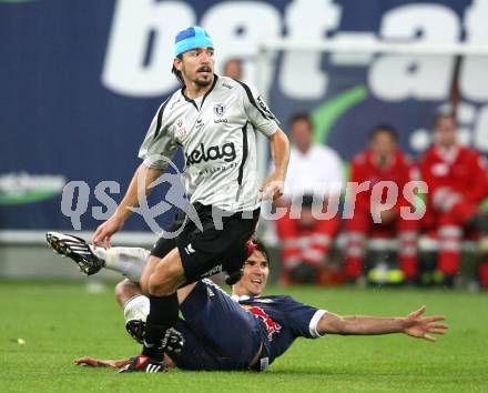 Fussball. Tipp3-Bundesliga. SK Austria Kelag Kaernten  gegen Red Bull Salzburg.  Fernando Troyansky (Austria Kaernten), Nikola Pokrivac (Red Bull Salzburg). Klagenfurt, 26.9.2009. 
Foto: Kuess

---
pressefotos, pressefotografie, kuess, qs, qspictures, sport, bild, bilder, bilddatenbank