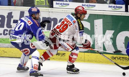 EBEL. Eishockey Bundesliga. EC Pasut VSV gegen KAC.  Mickey Elick,(VSV), Jeff Shantz (KAC). Villach, am 11.10.2009.
Foto: Nadja Kuess 


---
pressefotos, pressefotografie, kuess, qs, qspictures, sport, bild, bilder, bilddatenbank