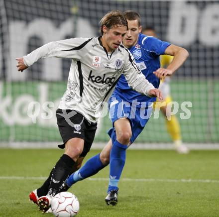 Fussball. Tipp3-Bundesliga. SK Austria Kaernten gegen Magna Wiener Neustadt. Marc Sand, (Austria Kaernten), Christian Ramsebner (Wiener Neustadt). Klagenfurt, 17.10.2009. 
Foto: Kuess

---
pressefotos, pressefotografie, kuess, qs, qspictures, sport, bild, bilder, bilddatenbank