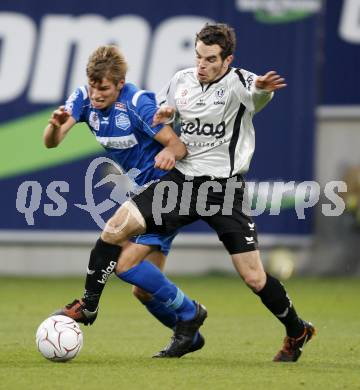 Fussball. Tipp3-Bundesliga. SK Austria Kaernten gegen Magna Wiener Neustadt. Wolfgang Mair, (Austria Kaernten), Alexander Gruenwald (Wiener Neustadt). Klagenfurt, 17.10.2009. 
Foto: Kuess

---
pressefotos, pressefotografie, kuess, qs, qspictures, sport, bild, bilder, bilddatenbank