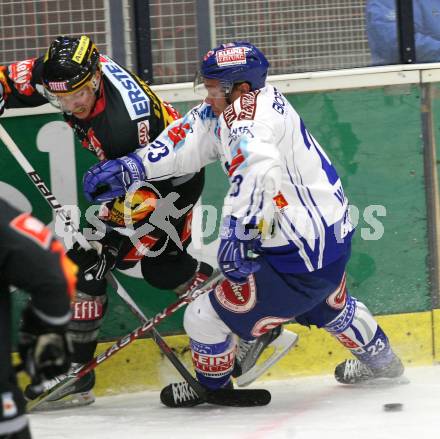 EBEL. Eishockey Bundesliga. EC Pasut VSV gegen Vienna Capitals.  Mikael Wahlberg, (VSV), Anton Tino Teppert (Caps). Villach, am 18.10.2009.
Foto: Kuess 


---
pressefotos, pressefotografie, kuess, qs, qspictures, sport, bild, bilder, bilddatenbank