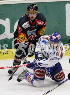 EBEL. Eishockey Bundesliga. EC Pasut VSV gegen Vienna Capitals.  Roland Kaspitz, (VSV), Christoph Draschkowitz (Caps). Villach, am 18.10.2009.
Foto: Kuess 


---
pressefotos, pressefotografie, kuess, qs, qspictures, sport, bild, bilder, bilddatenbank