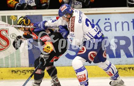 EBEL. Eishockey Bundesliga. EC Pasut VSV gegen Vienna Capitals.  Guenther Lanzinger, (VSV),  Rafael Rotter (Caps). Villach, am 18.10.2009.
Foto: Kuess 


---
pressefotos, pressefotografie, kuess, qs, qspictures, sport, bild, bilder, bilddatenbank