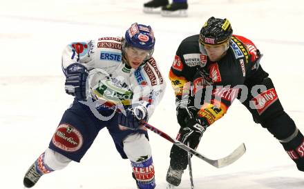 EBEL. Eishockey Bundesliga. EC Pasut VSV gegen Vienna Capitals.  Nico Toff, (VSV),  David Rodman (Caps). Villach, am 18.10.2009.
Foto: Kuess 


---
pressefotos, pressefotografie, kuess, qs, qspictures, sport, bild, bilder, bilddatenbank