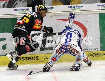 EBEL. Eishockey Bundesliga. EC Pasut VSV gegen Vienna Capitals.  Roland Kaspitz, (VSV), Ales Kranjc (Caps). Villach, am 18.10.2009.
Foto: Kuess 


---
pressefotos, pressefotografie, kuess, qs, qspictures, sport, bild, bilder, bilddatenbank