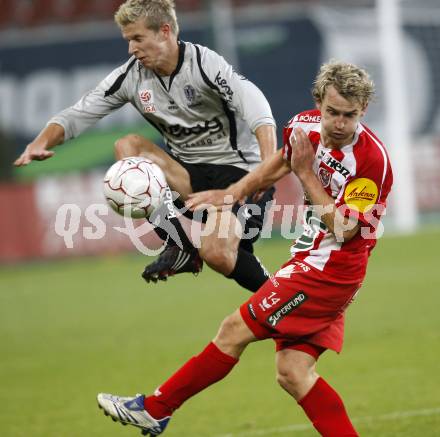 Fussball. Tipp3-Bundesliga. SK Austria Kela Kaernten gegen SV Superfund Kapfenberg. Thomas Hinum,  (Austria Kaernten) Markus Felfernig (Kapfenberg). Klagenfurt, 24.10.2009.
Foto: Kuess  

---
pressefotos, pressefotografie, kuess, qs, qspictures, sport, bild, bilder, bilddatenbank