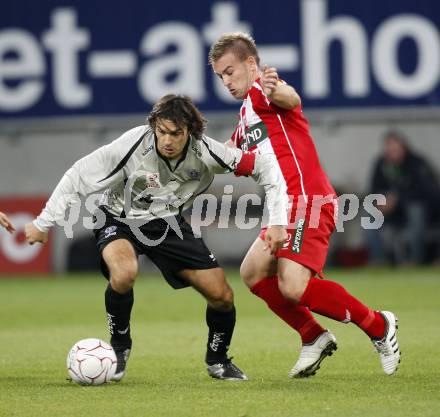 Fussball. Tipp3-Bundesliga. SK Austria Kelag Kaernten gegen SV Superfund Kapfenberg. Jocelyn Blanchard, (Austria Kaernten) 
 David Sencar (Kapfenberg). Klagenfurt, 24.10.2009.
Foto: Kuess  

---
pressefotos, pressefotografie, kuess, qs, qspictures, sport, bild, bilder, bilddatenbank