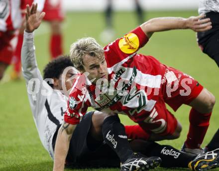 Fussball. Tipp3-Bundesliga. SK Austria Kelag Kaernten gegen SV Superfund Kapfenberg. Sandro Ferreira Da Silva, (Austria Kaernten) Markus Felfernig  (Kapfenberg). Klagenfurt, 24.10.2009.
Foto: Kuess  

---
pressefotos, pressefotografie, kuess, qs, qspictures, sport, bild, bilder, bilddatenbank