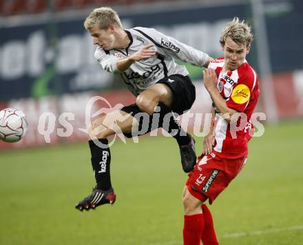 Fussball. Tipp3-Bundesliga. SK Austria Kelag Kaernten gegen SV Superfund Kapfenberg. Thomas Hinum, (Austria Kaernten) Markus Felfernig (Kapfenberg). Klagenfurt, 24.10.2009.
Foto: Kuess  

---
pressefotos, pressefotografie, kuess, qs, qspictures, sport, bild, bilder, bilddatenbank