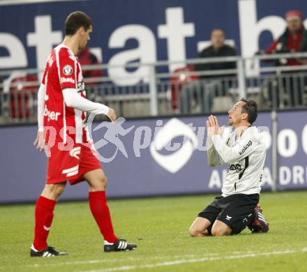 Fussball. Tipp3-Bundesliga. SK Austria Kelag Kaernten gegen SV Superfund Kapfenberg. Matthias Dolonger,  (Austria Kaernten) Thomas Schoenberger (Kapfenberg). Klagenfurt, 24.10.2009.
Foto: Kuess  

---
pressefotos, pressefotografie, kuess, qs, qspictures, sport, bild, bilder, bilddatenbank