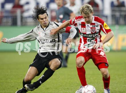 Fussball. Tipp3-Bundesliga. SK Austria Kelag Kaernten gegen SV Superfund Kapfenberg. Jocelyn Blanchard, (Austria Kaernten)  Markus Felfernig (Kapfenberg). Klagenfurt, 24.10.2009.
Foto: Kuess  

---
pressefotos, pressefotografie, kuess, qs, qspictures, sport, bild, bilder, bilddatenbank