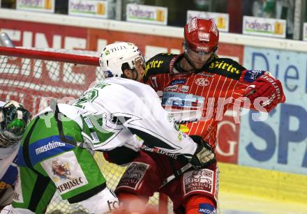 EBEL. Eishockey Bundesliga. KAC gegen HDD TILIA Olimpija Ljubljana.  Gregor Hager, (KAC), Greg Kuznik (Ljubljana). Klagenfurt, am 27.10.2009.
Foto: Kuess 

---
pressefotos, pressefotografie, kuess, qs, qspictures, sport, bild, bilder, bilddatenbank